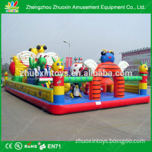 Amusement Park Children and Adult Playing Giant Bounce Playground